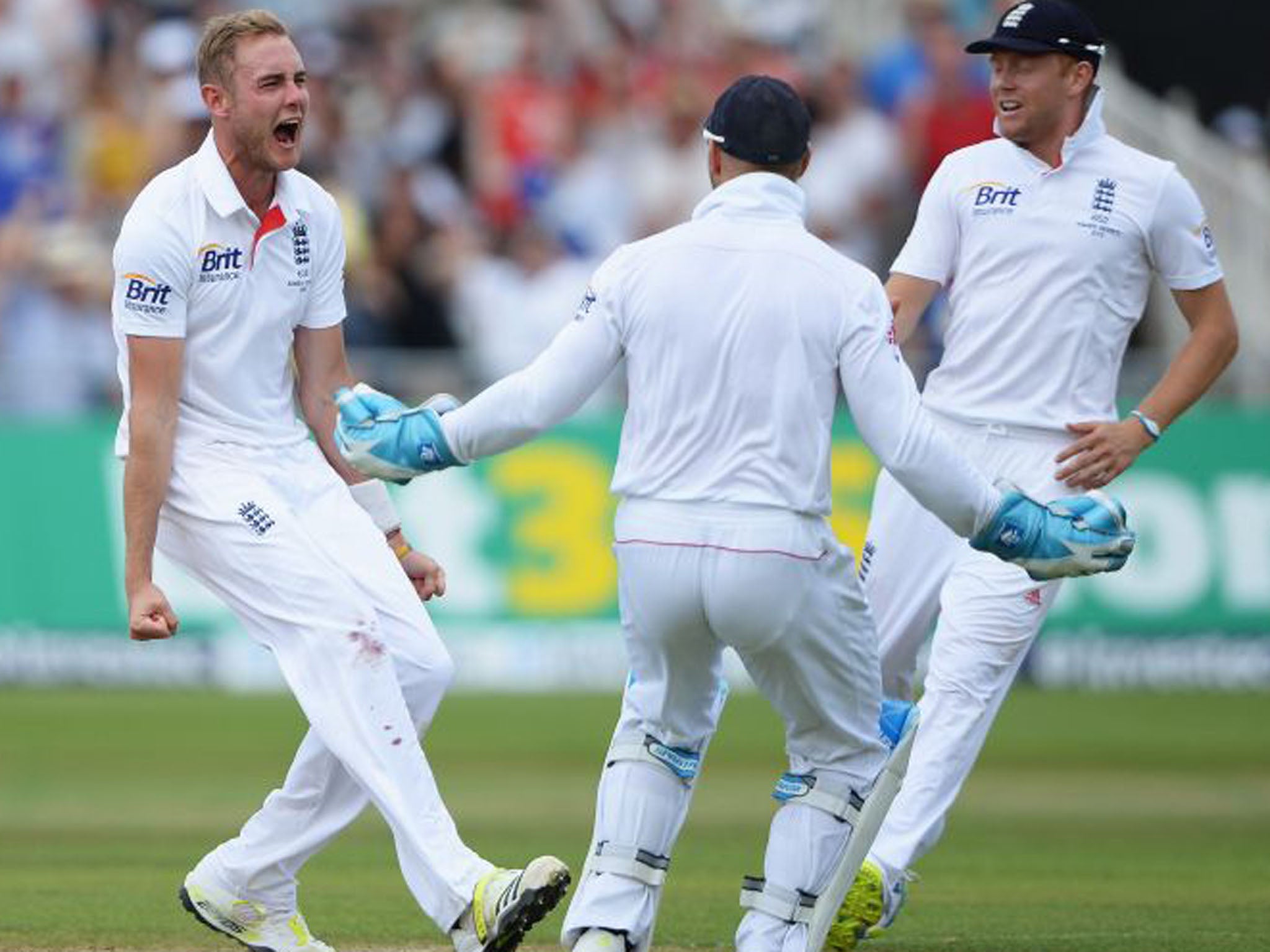Stuart Broad celebrates the wicket of Australia's Shane Watson to get England on the board after an opening stand of 84 (Gareth Copley/Getty Images)