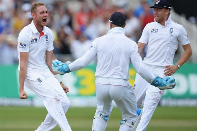 Stuart Broad celebrates the wicket of Australia's Shane Watson to get England on the board after an opening stand of 84 (Gareth Copley/Getty Images)