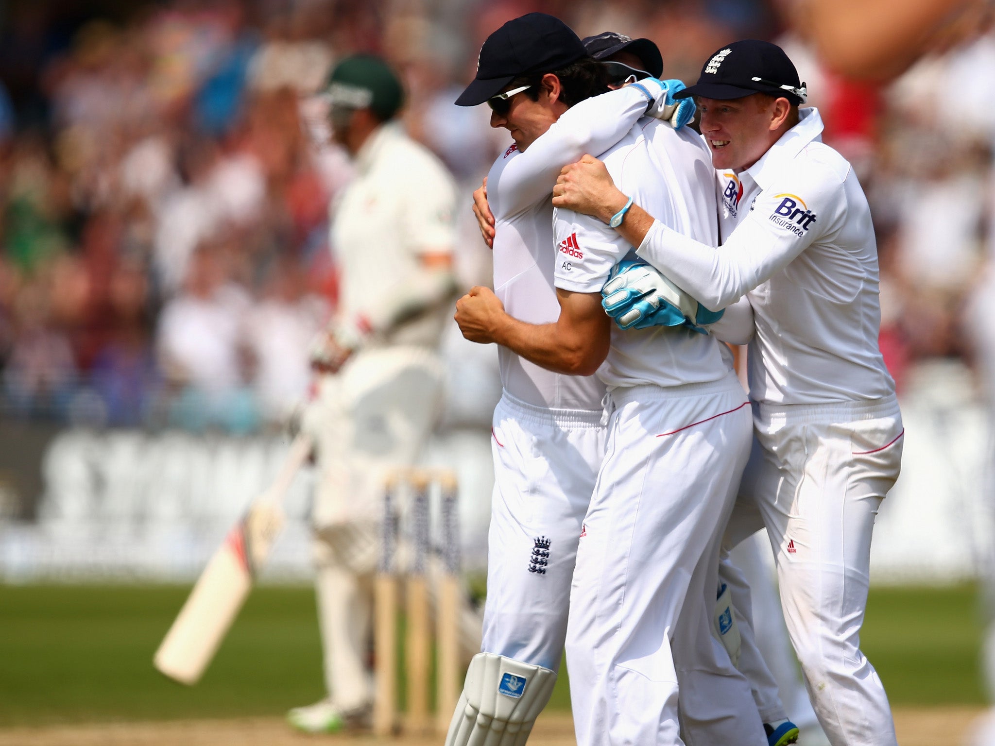 Alastair Cook of England celebrates after catching Peter Siddle of Australia off the bowling of James Anderson