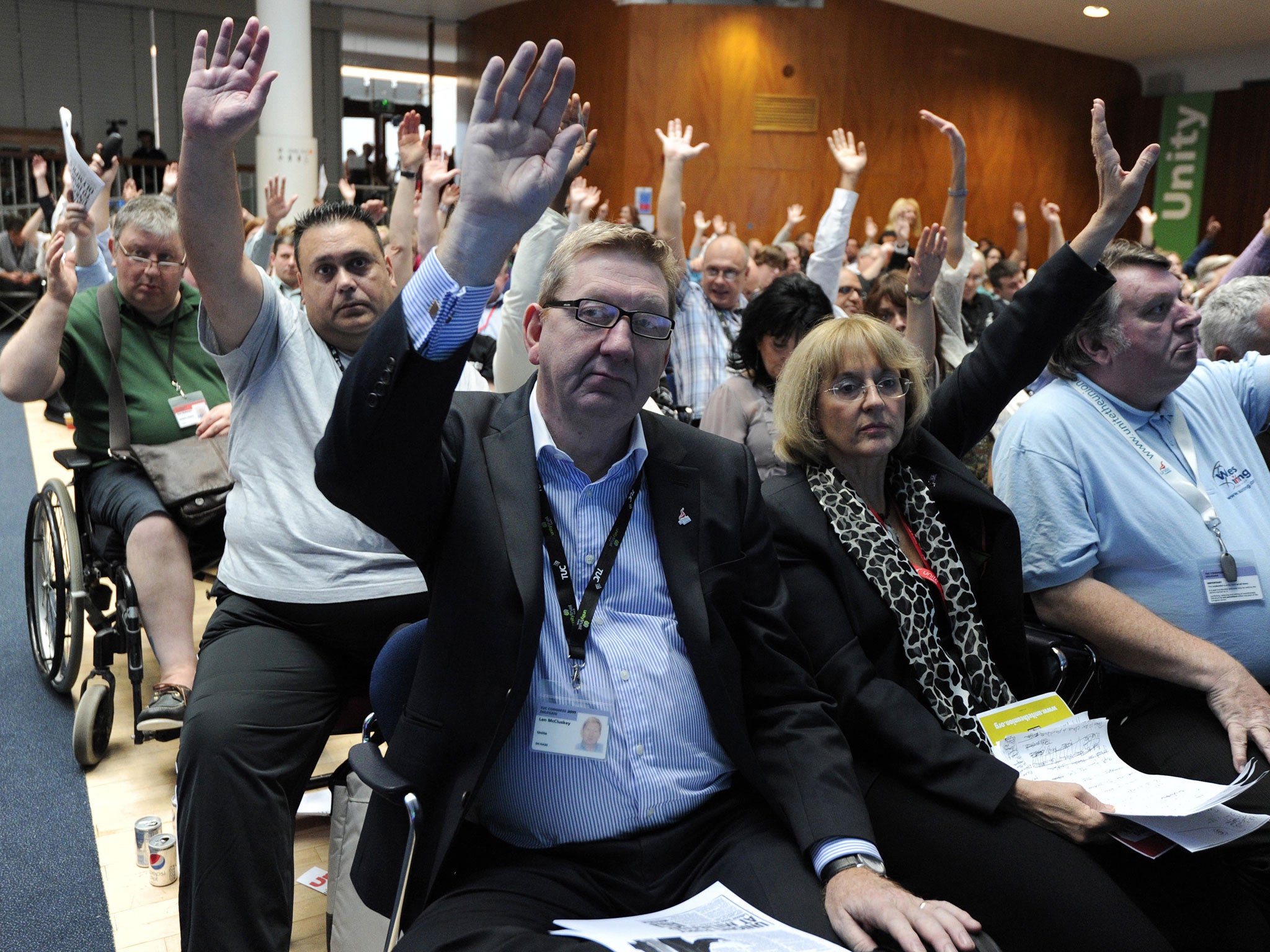 Unite General Secretary Len McCluskey (Front Row L) votes during the third day of the annual Trade Union Congress (TUC) in central London, on September 14, 2011.