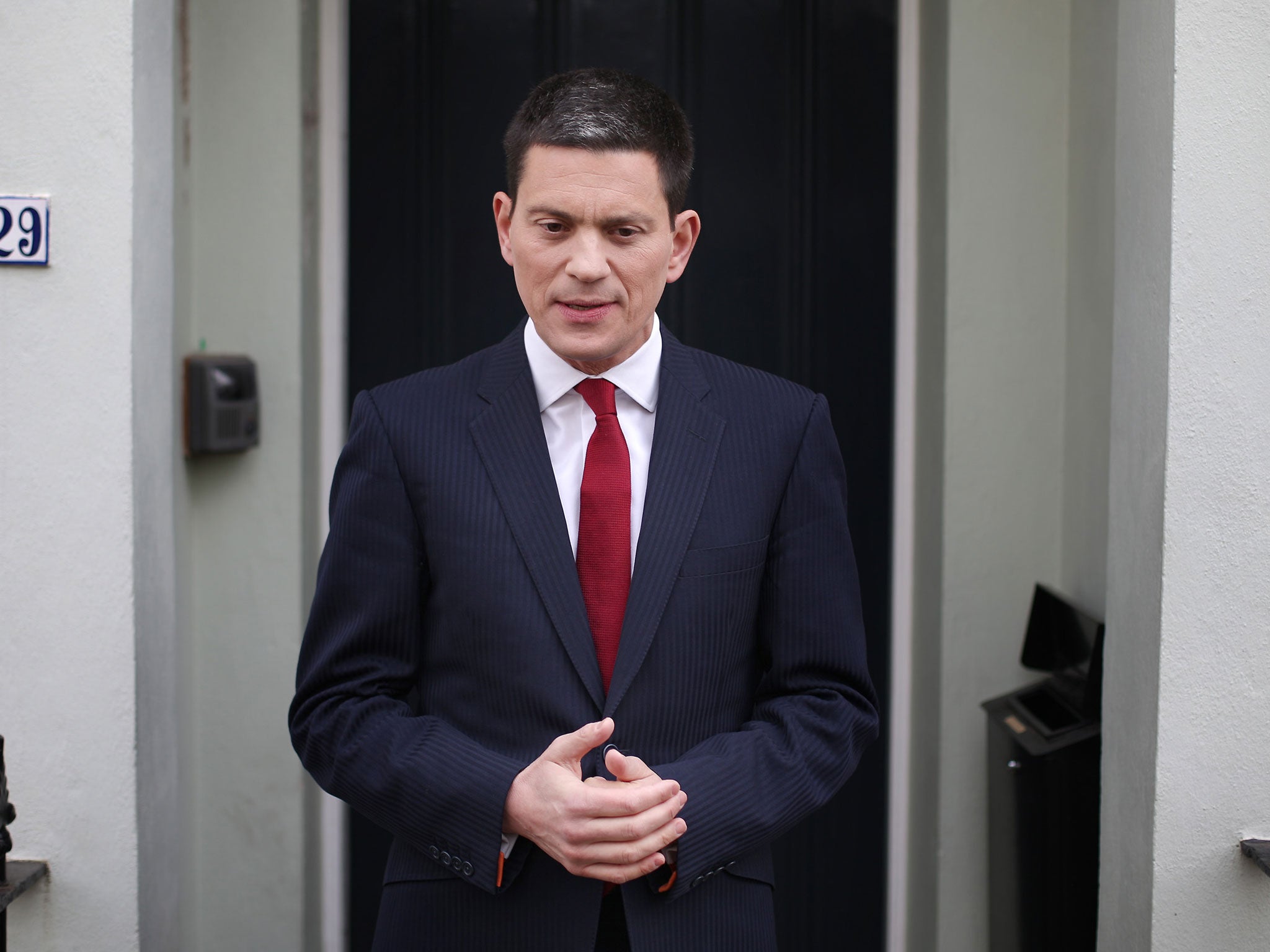 Former Foreign Secretary David Miliband talks to reporters at his home on March 27, 2013 in London, England. Mr Miliband, brother of the opposition Labour Party leader Ed Miliband, has announced that he is to step down as a Member of Parliament and will move to New York to work for the International Rescue Committee.