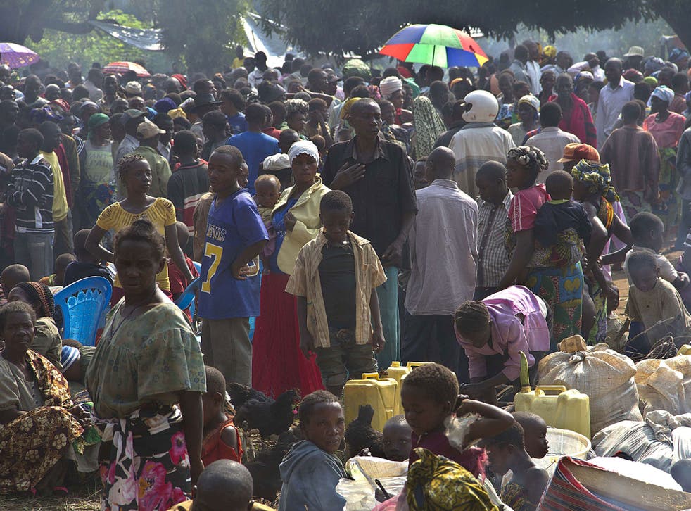 Congolese refugees wait at the Busunga border post in Uganda
