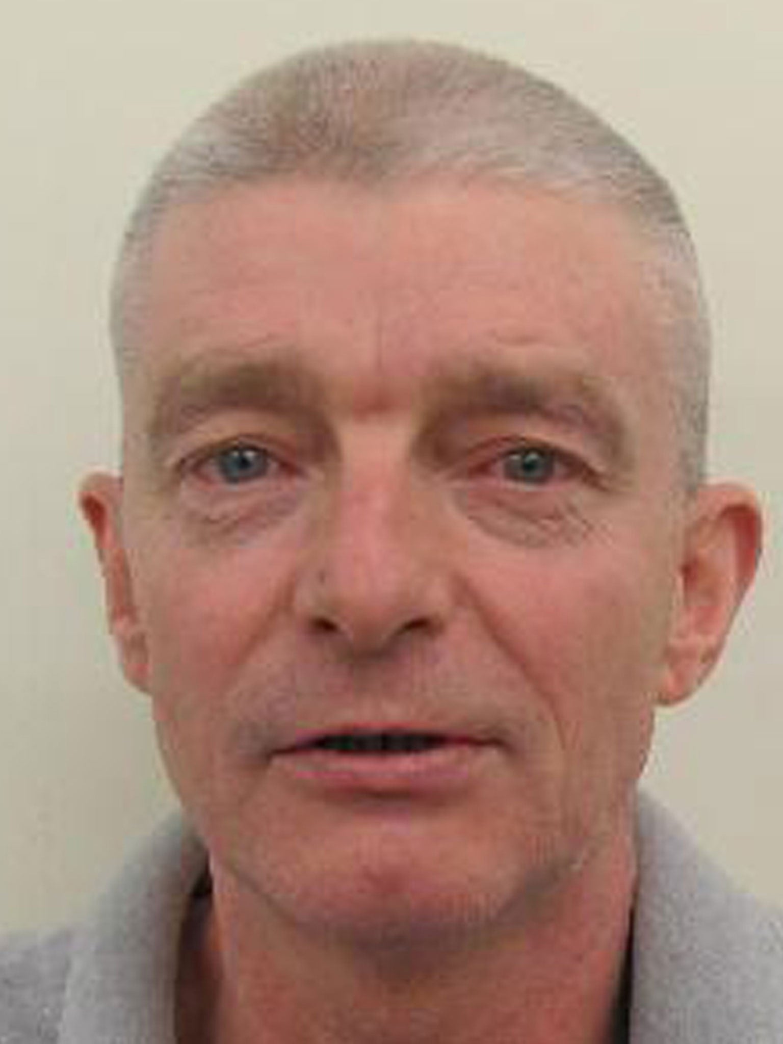 Ian John McLoughlin, who is being sought for the stabbing, is believed to have recently come out of prison