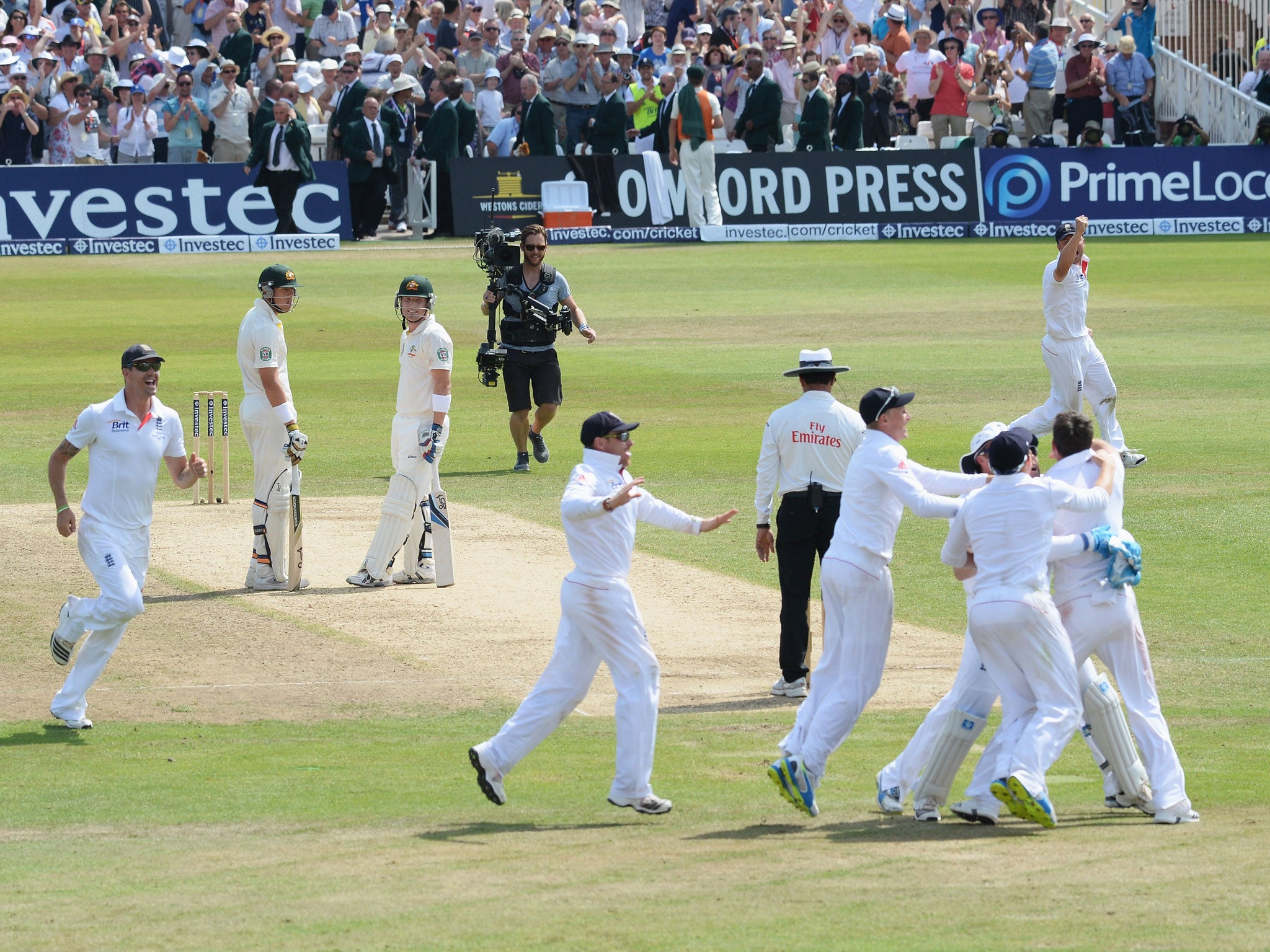 England celebrate victory as the review verdict reveals that Brad Haddin is out