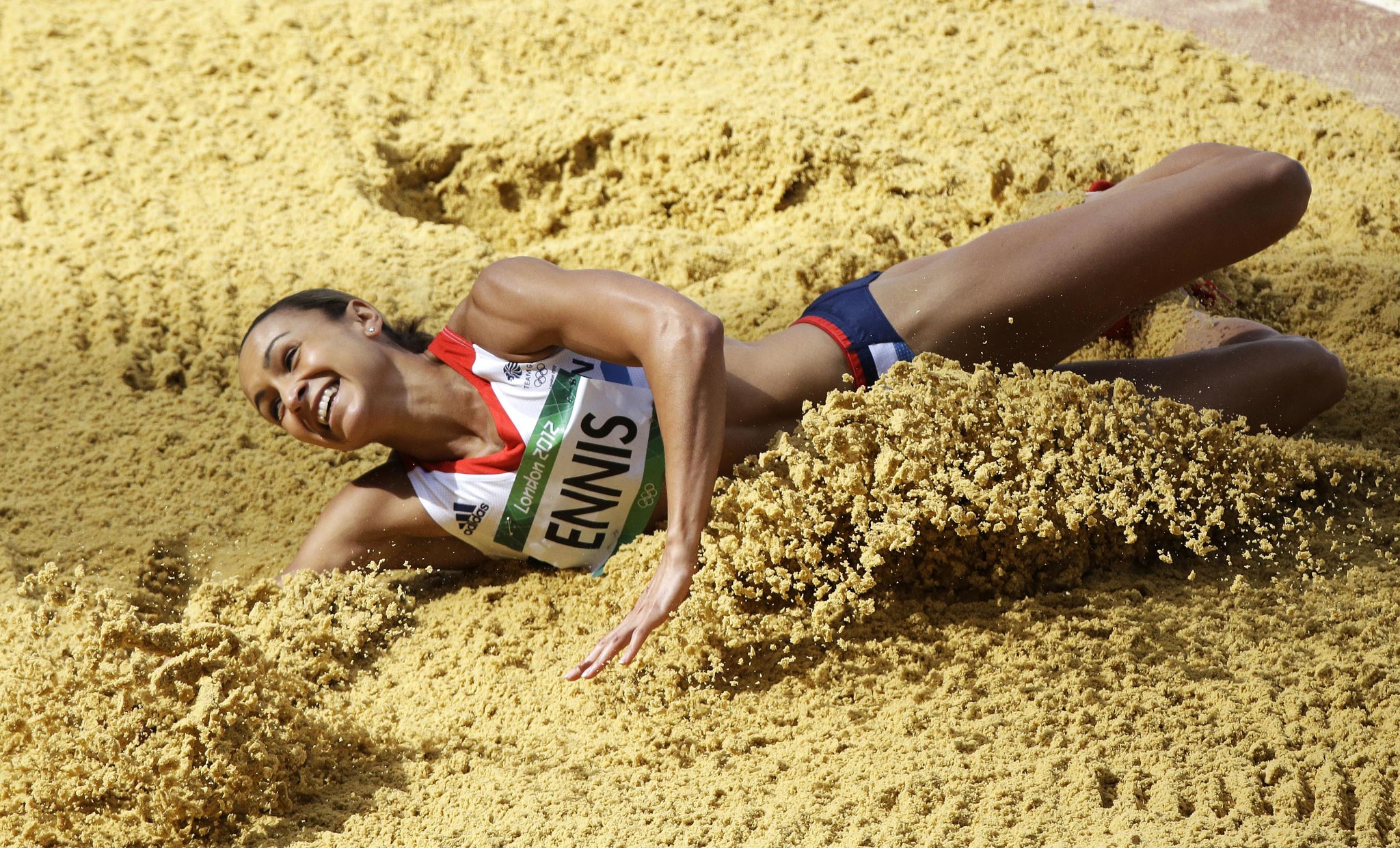 Britain's Jessica Ennis lands a jump during the long jump heptathlon during the athletics in the Olympic Stadium at the 2012 Summer Olympics, London