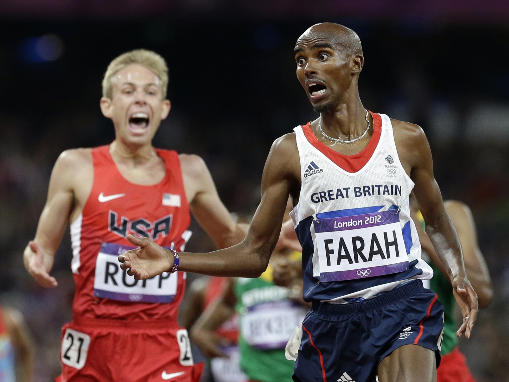 Mo Farah (right) crosses the line to win 10,000m gold ahead of Rupp in 2012