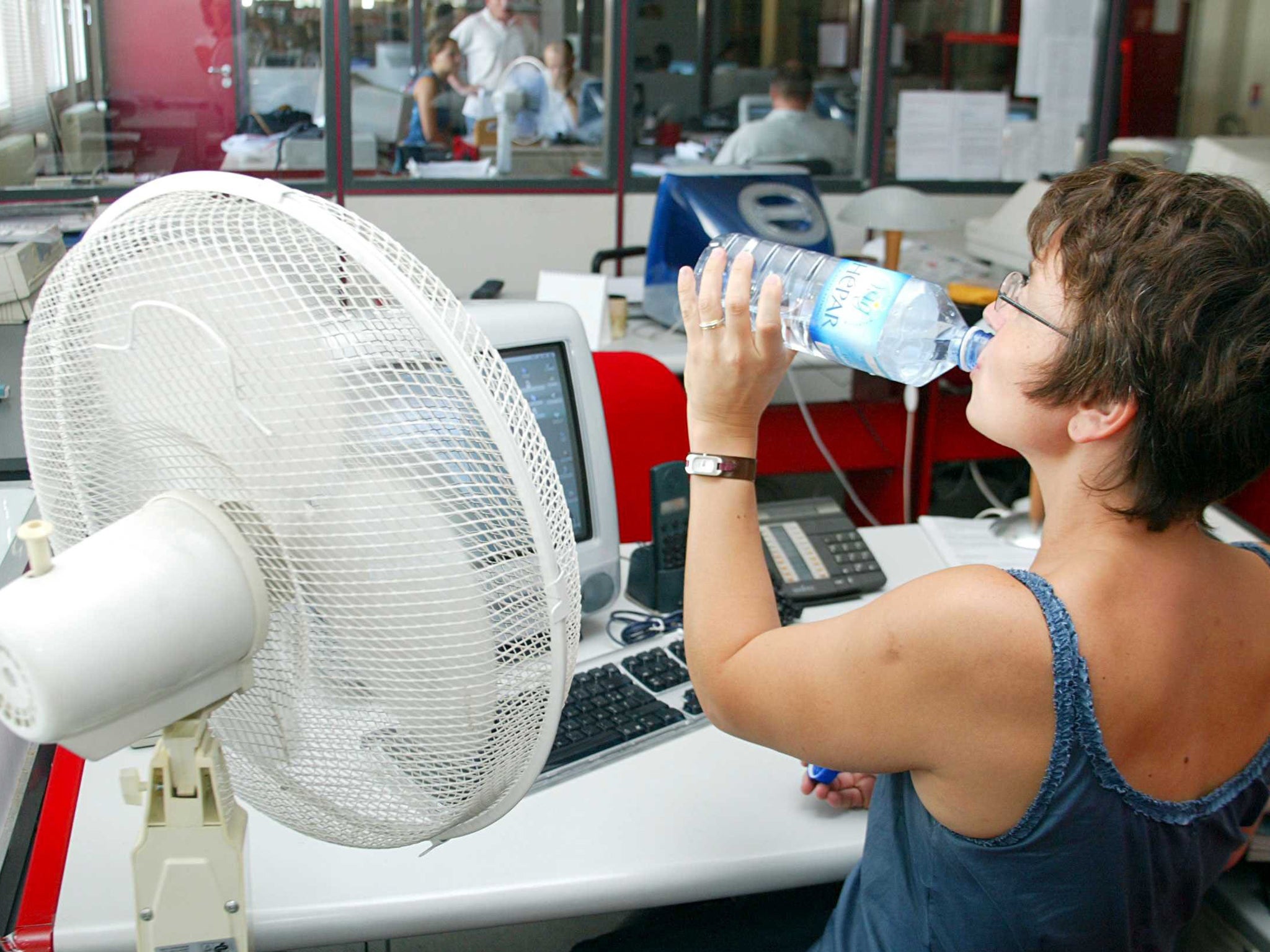 As temperatures soar, offices become increasingly uncomfortable places to work