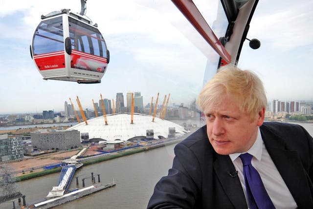 Boris Johnson taking one of the first rides on the Emirates Air Line last year