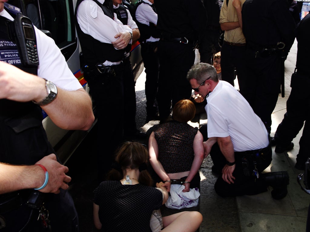 A student protester is arrested at ULU