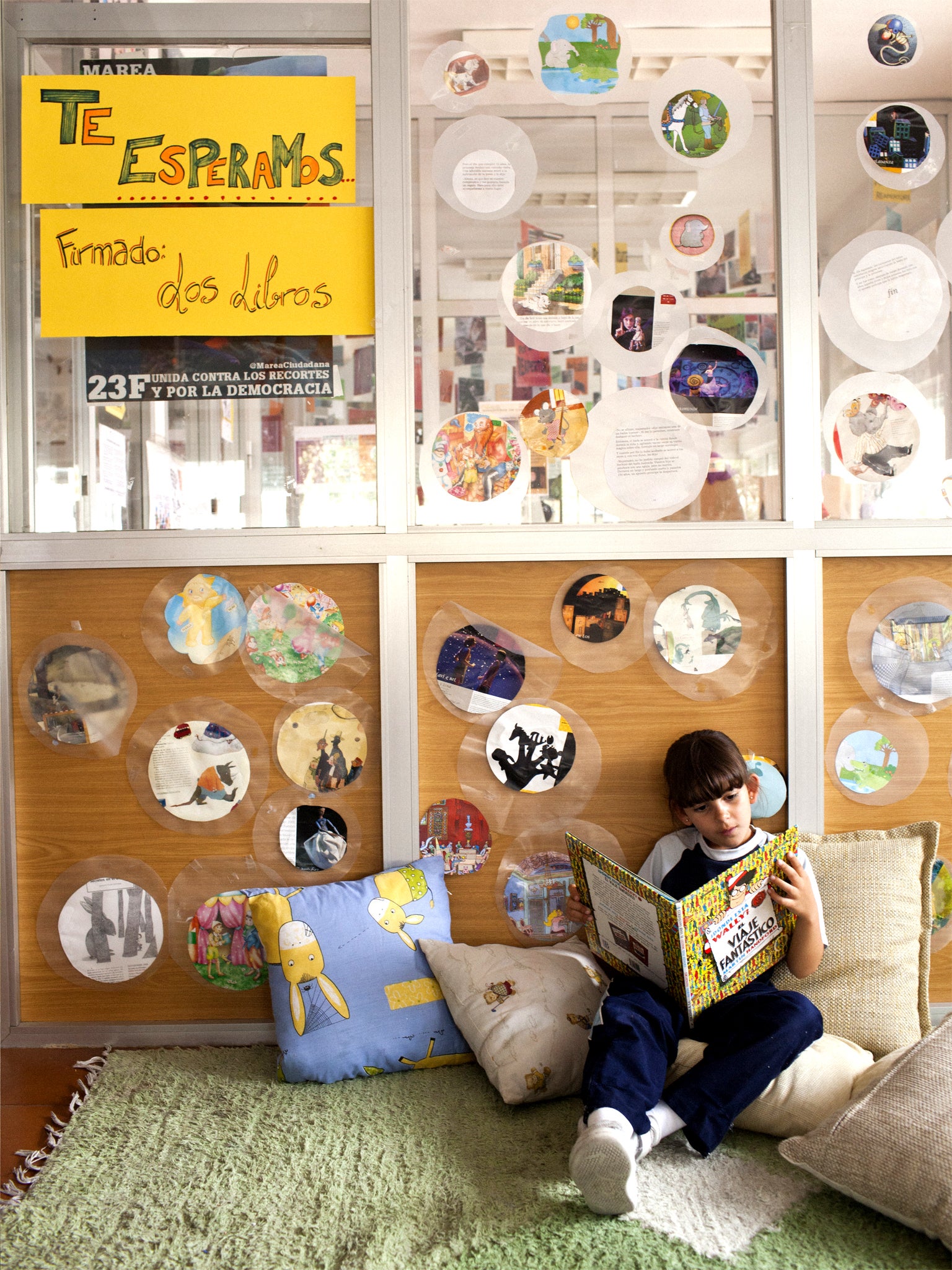 Marta catches up on her homework in the Las Palomas library