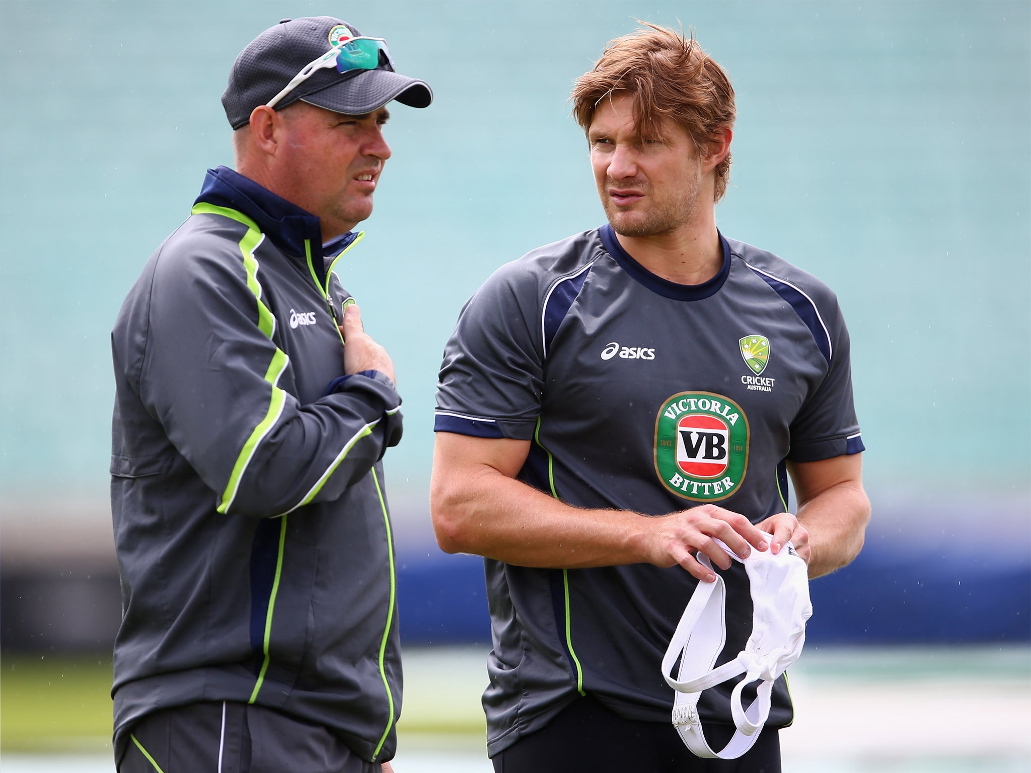 Mickey Arthur (left) speaks to Shane Watson during his days as Australia coach
