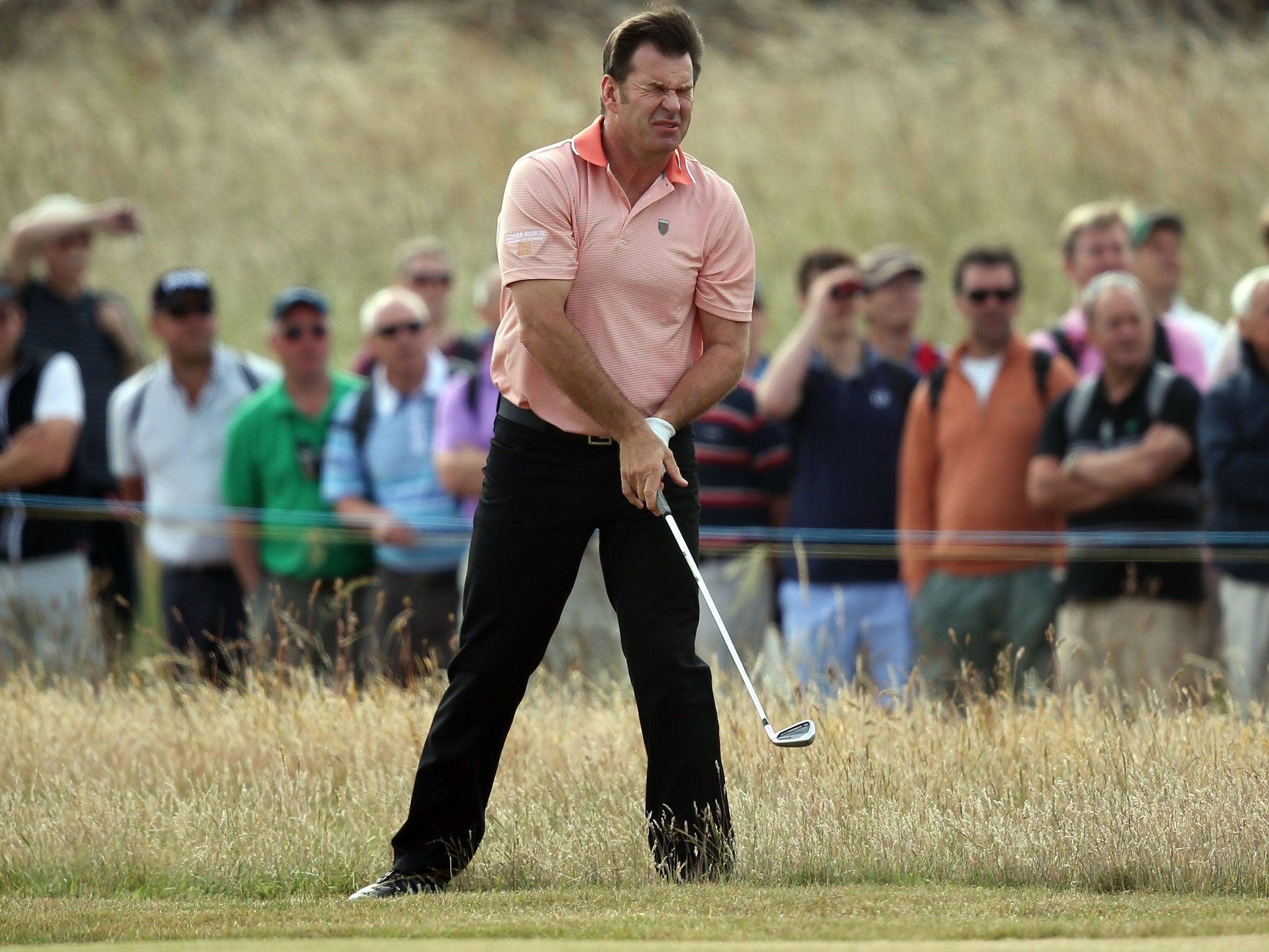Nick Faldo cuts a frustrated figure on first fairway