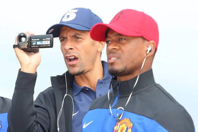 Rio Ferdinand and Patrice Evra of Manchester United visits Manley Beach as part of their pre-season tour