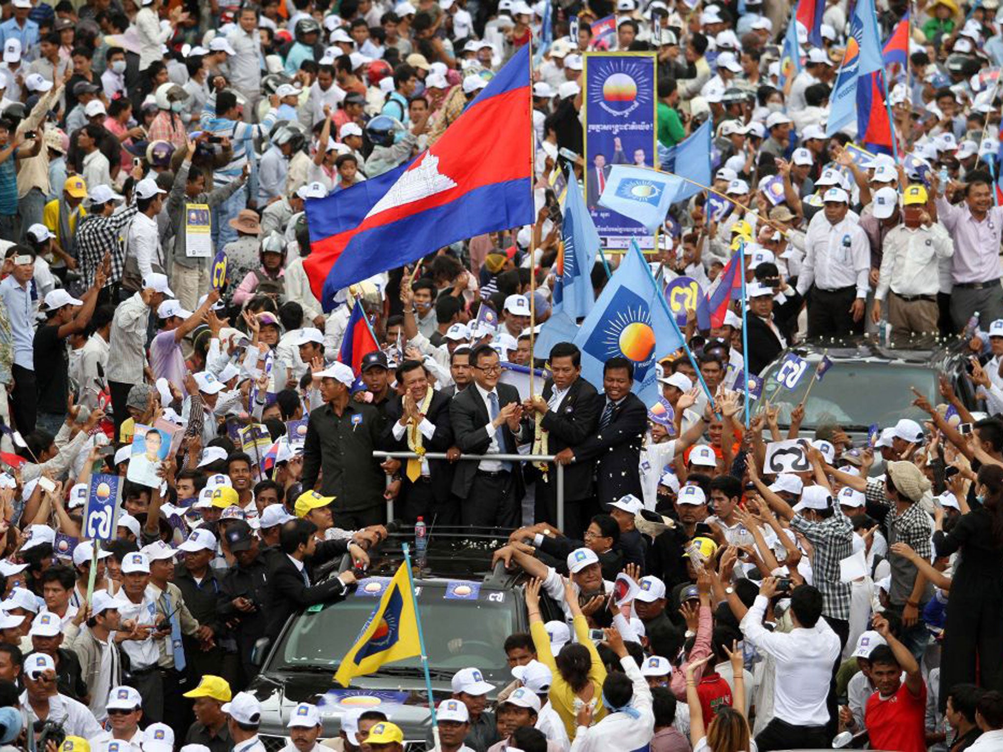 Opposition leader Sam Rainsy, centre, in Phnom Penh