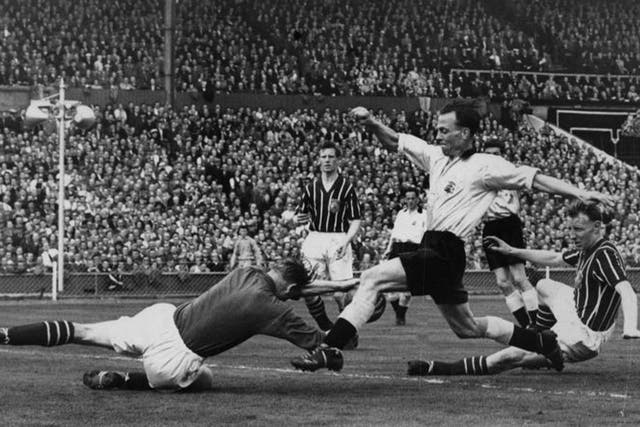 Bert Trautmann in the 1956 FA Cup Final against Birmingham City; he broke his neck making this save