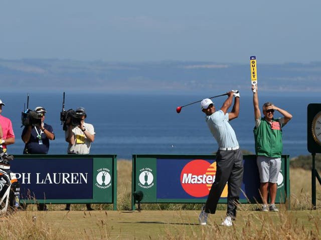 Tiger Woods, who shot a par 71, tees off at the sixth yesterday