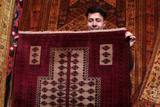 Millions of hand-woven rugs are turned out in Tehran but machine-made alternatives are  beginning to outsell them