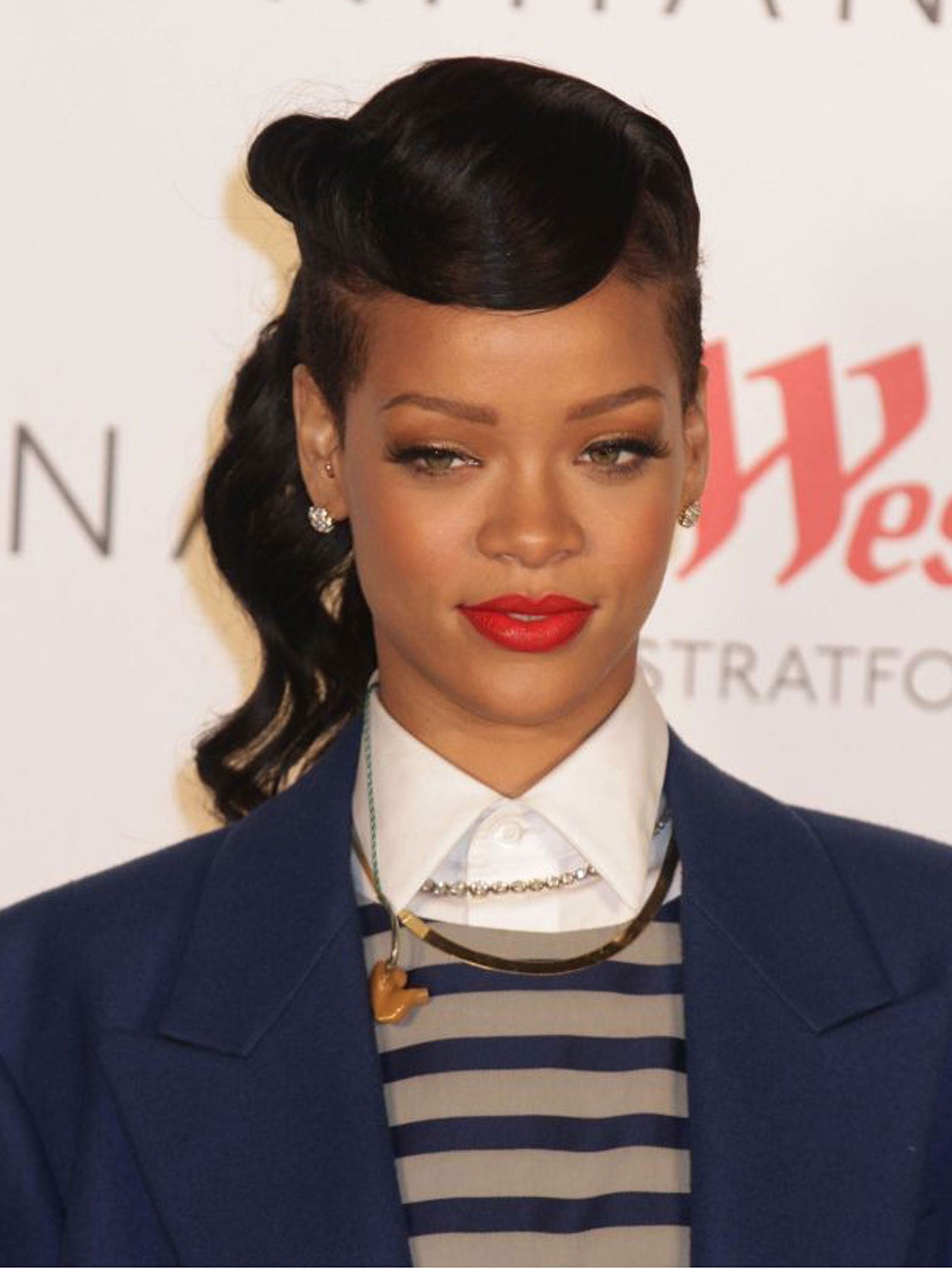 Rhianna has begun legal action against clothing giant Topshop over her image being use don T-shirts