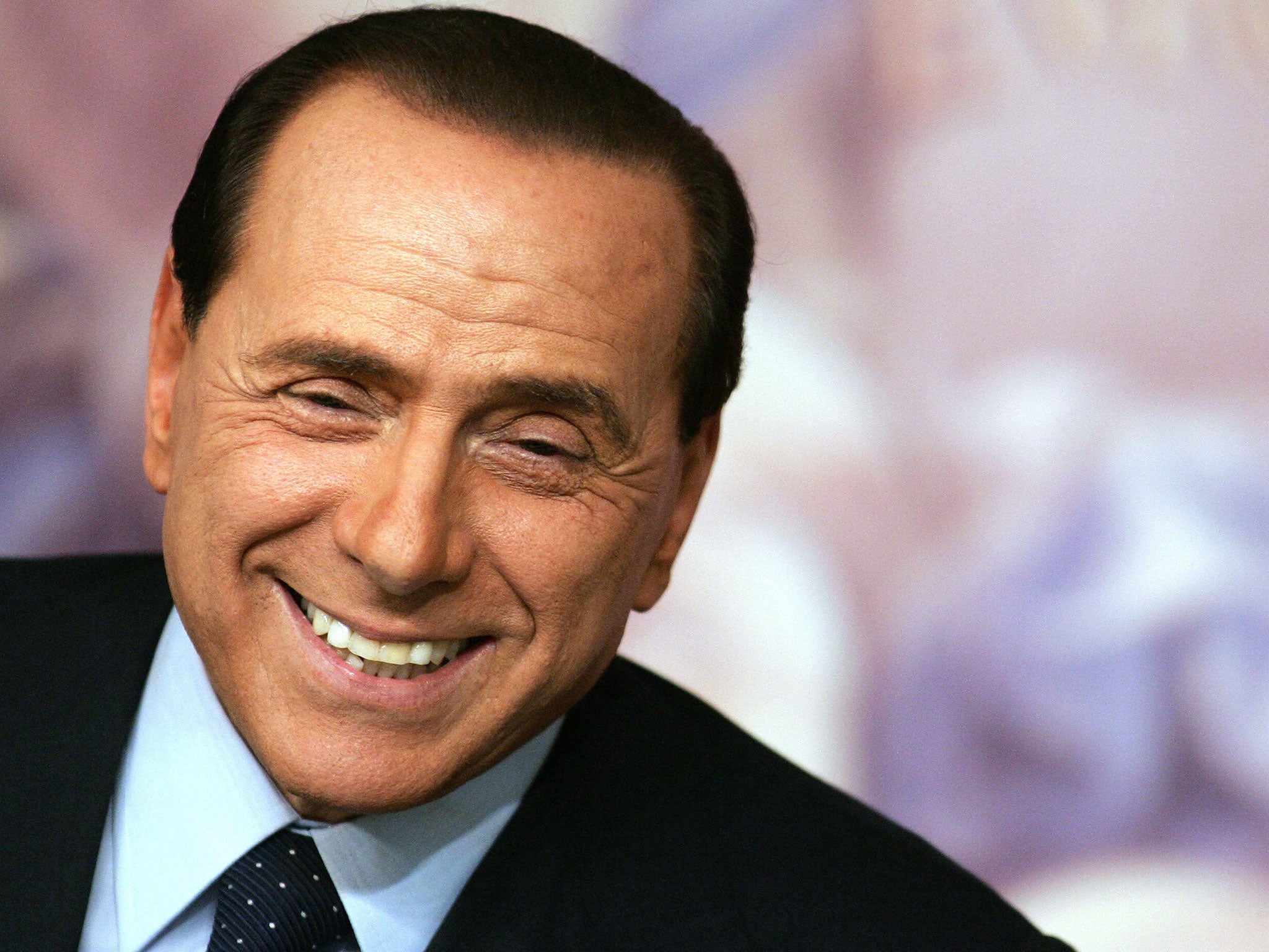 Close ties: Critics say that Silvio Berlusconi has ‘systematically prostituted’ the country