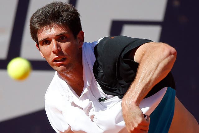 Argy bargy: Federico Delbonis on his way to victory over Roger Federer