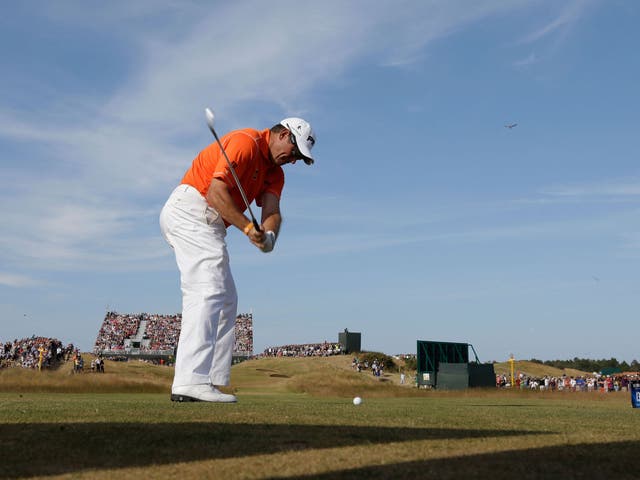Out of the blue: Lee Westwood on the 13th tee at Muirfield on his way to a two-stroke lead  