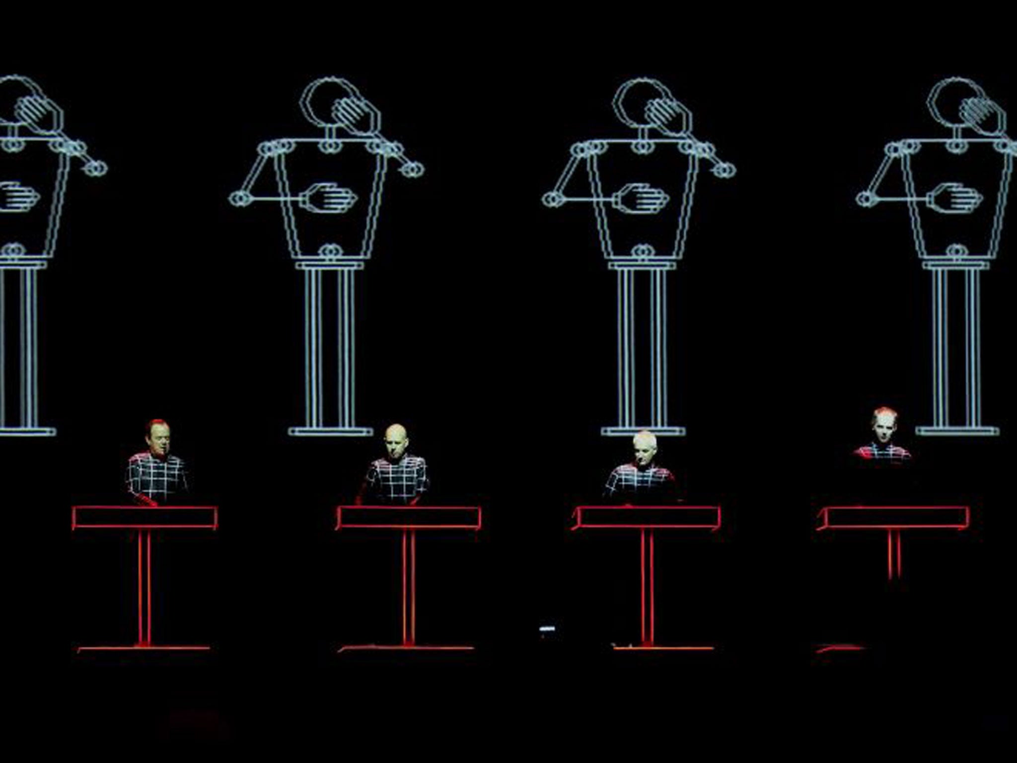 Kraftwerk performing on the Obelisk stage during the Latitude Festival at Henham Park near Southwold, Suffolk