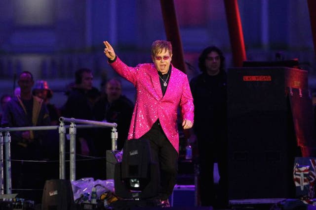 Singer Sir Elton John performing on stage during the Diamond Jubilee concert at Buckingham Palace last year