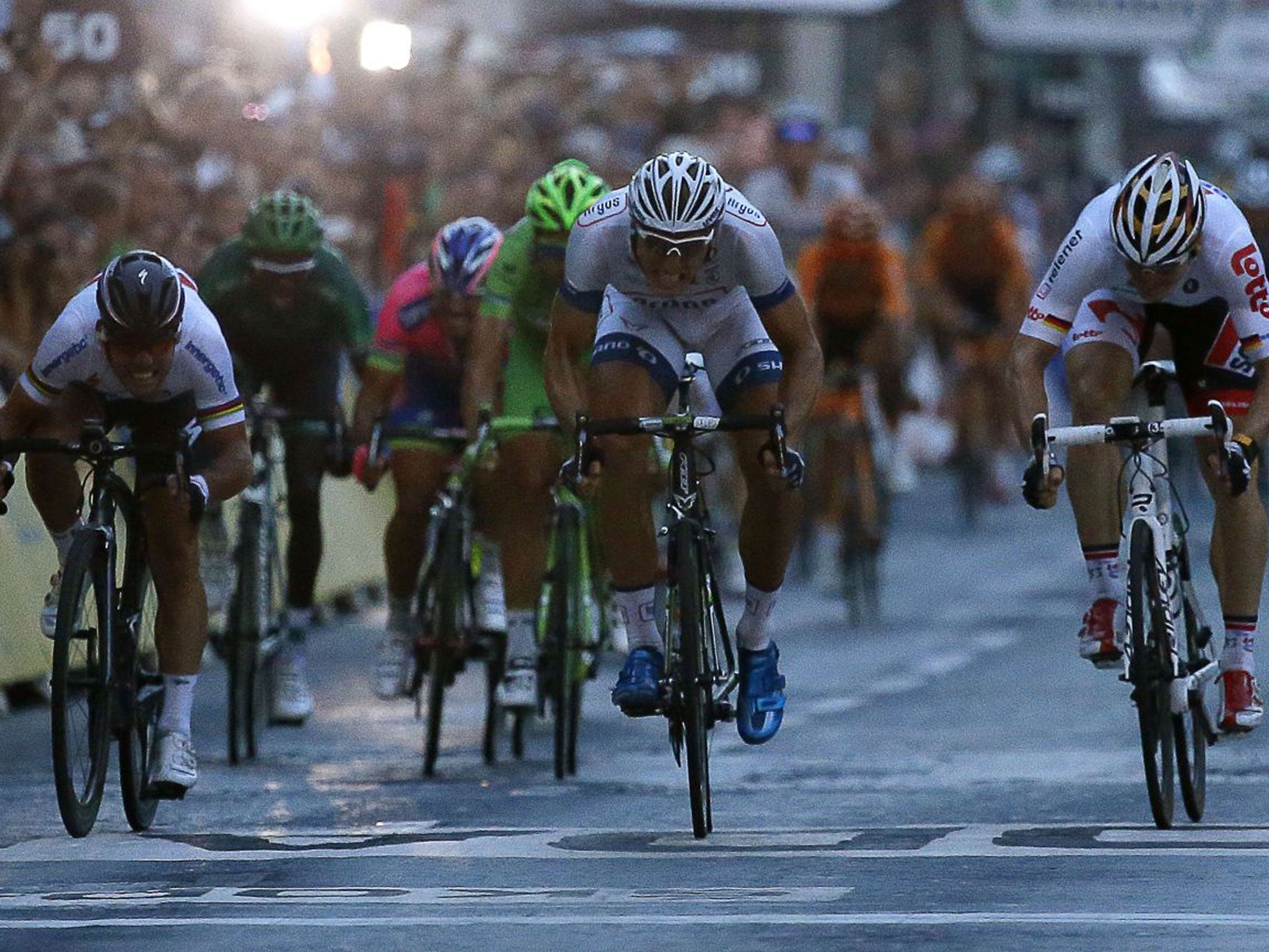 Marcel Kittel beats Mark Cavendish, left, to the line in Paris