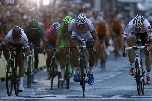 Marcel Kittel beats Mark Cavendish, left, to the line in Paris 