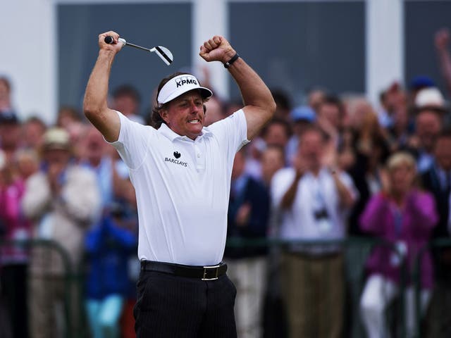 Phil Mickelson celebrates his birdie on the 18th