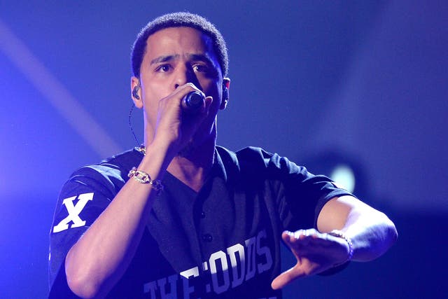 US rapper J Cole has apologised for a lyric in which he calls autistic people retarded 