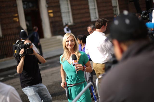 An Italian TV journalist reports from outside St Mary's Hospital in London, England