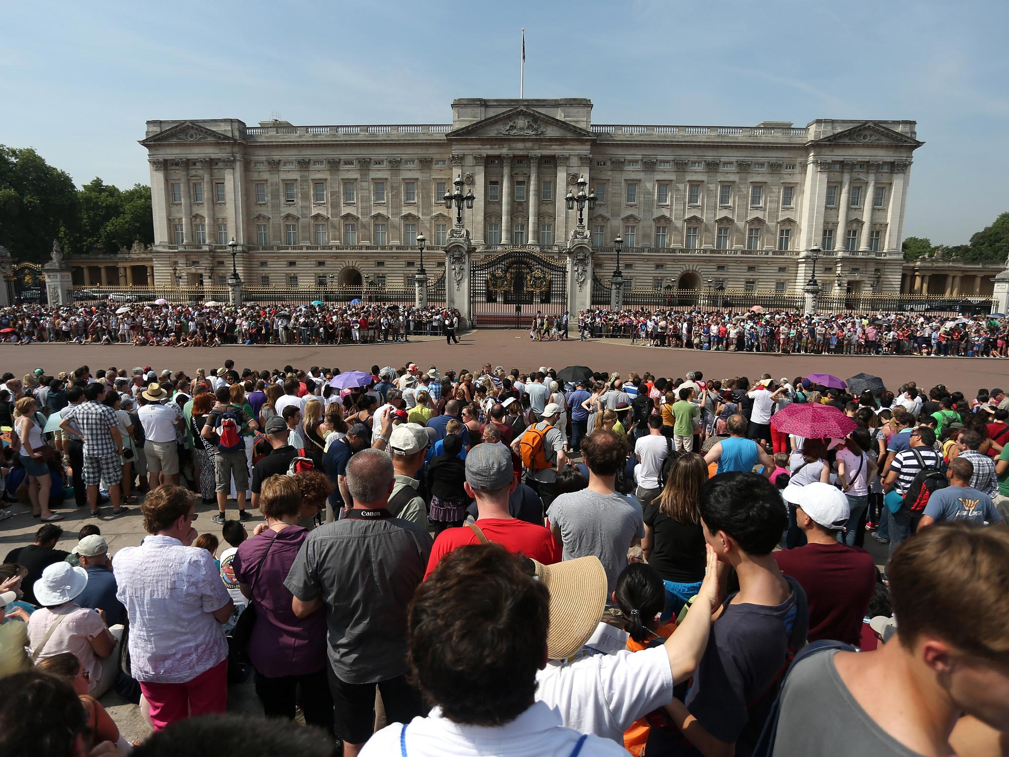 Crowds gathered at Buckingham Palace by mid-morning