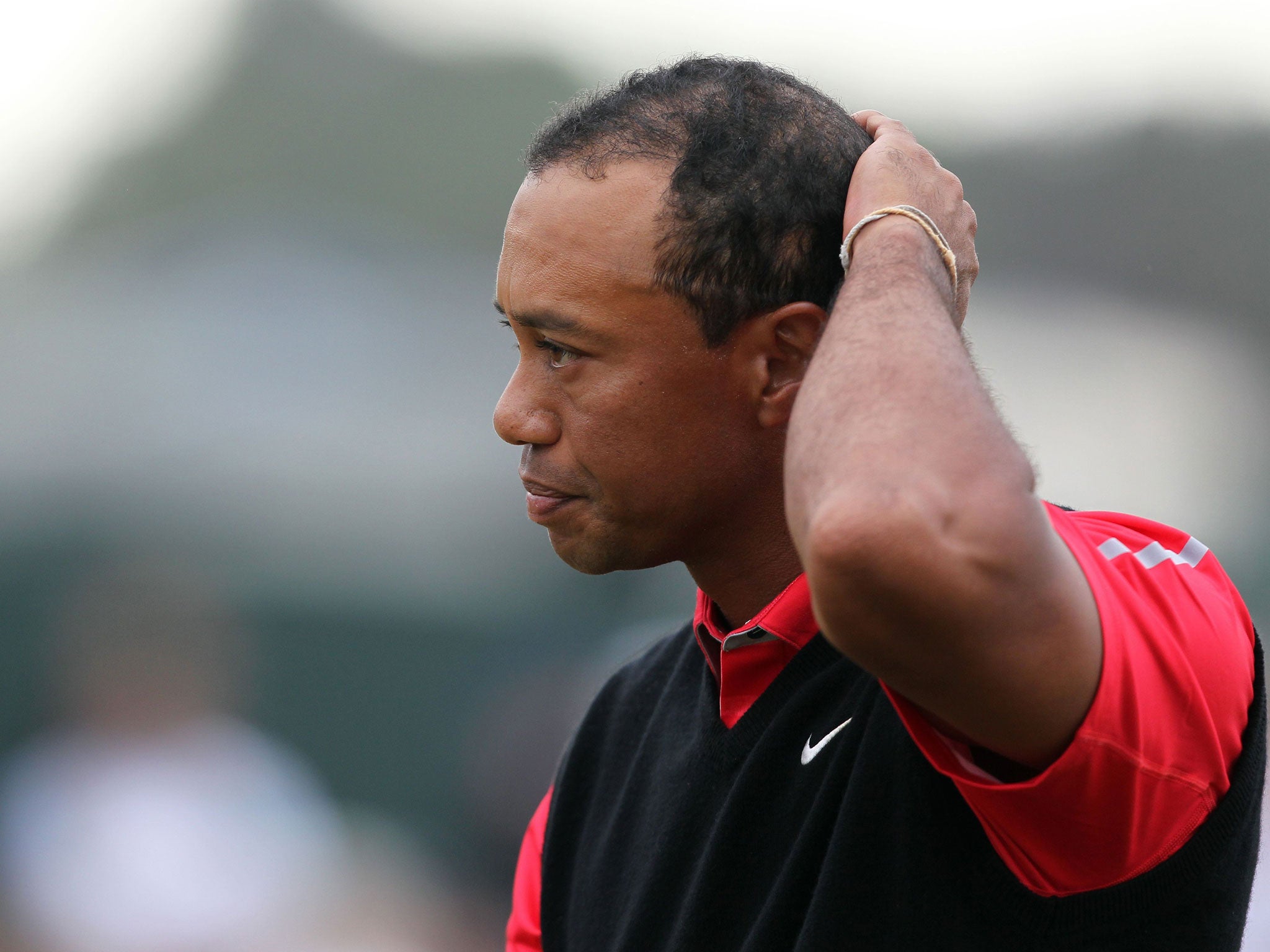 Tiger Woods reacts after finishing his final round
