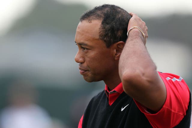 Tiger Woods reacts after finishing his final round