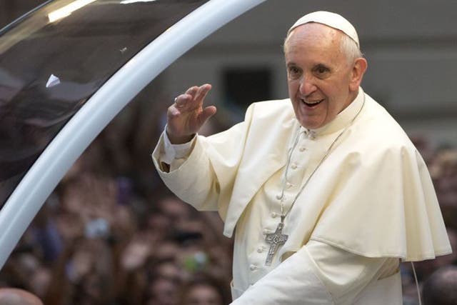 Panel of fashion experts praise his simple "popewear" choices