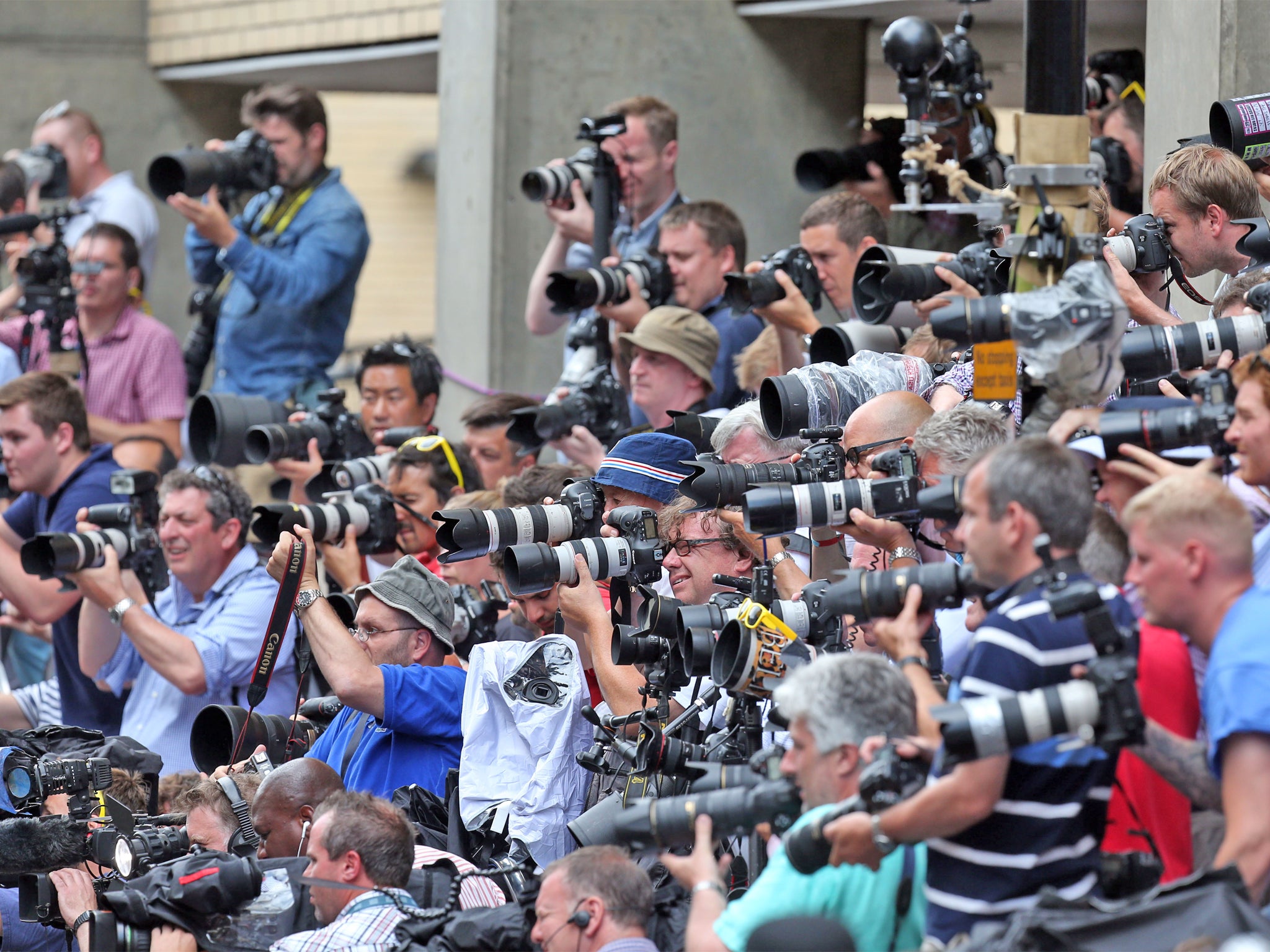 Photographers take pictures of The Duchess of Cambridge's parents outside the Lindo Wing of St Mary's Hospital