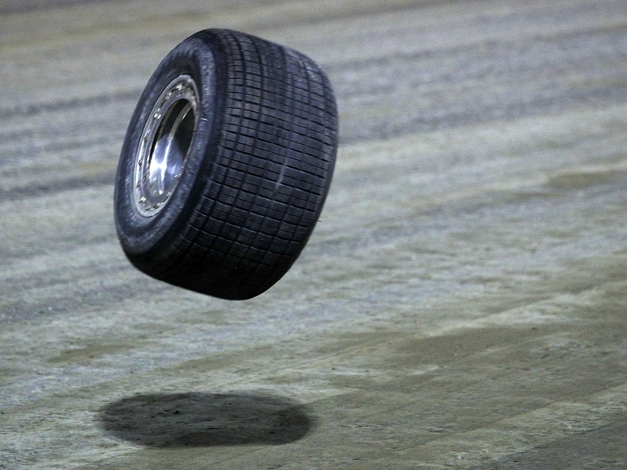 A tire from the car driven by Tony Kanaan (not pictured) bounces on the track during the running of Prelude To The Dream at Eldora Speedway on June 8, 2011 in Rossburg, Ohio.