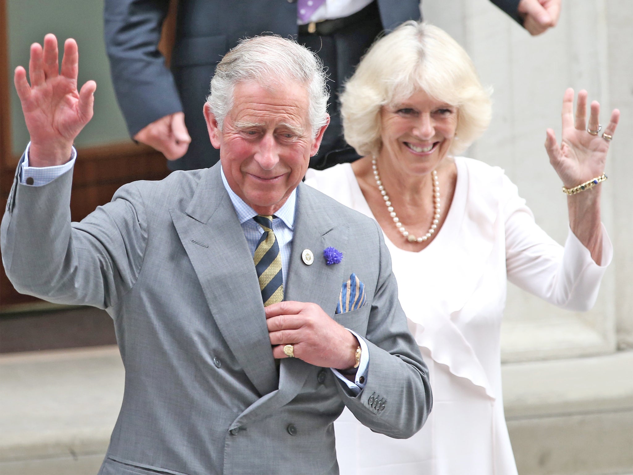 Prince Charles and Camilla leave The Lindo Wing after visiting The Duke and Duchess Of Cambridge and their newborn son at St Mary's.