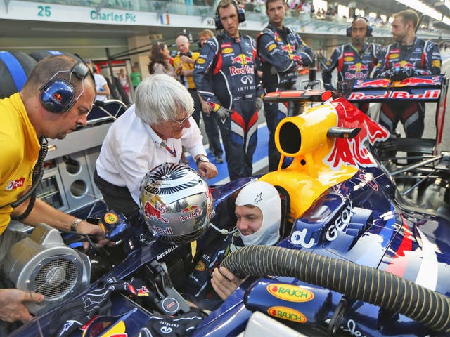F1 supremo Bernie Ecclestone with driver Sebastian Vettel at last year’s Abu Dhabi Grand Prix