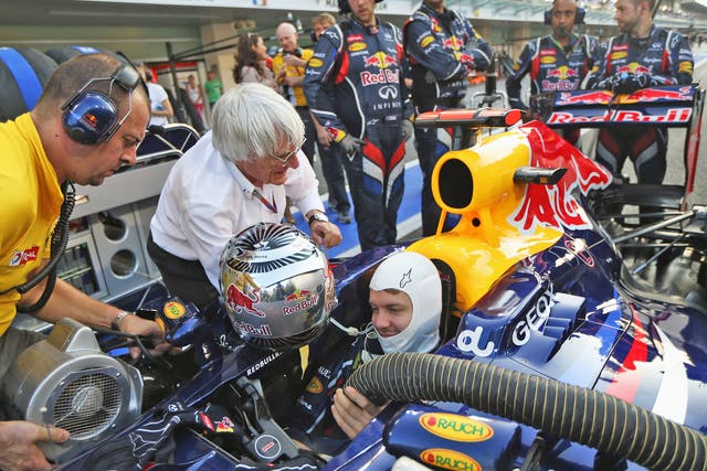 F1 supremo Bernie Ecclestone with driver Sebastian Vettel 