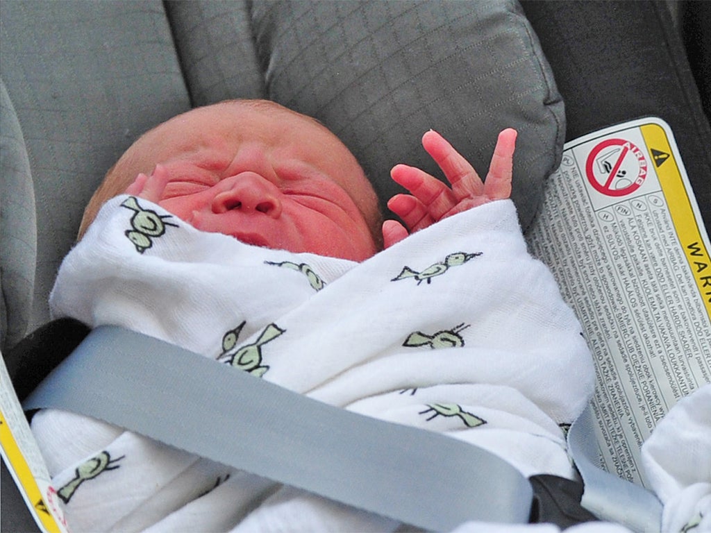 Prince William and Catherine, Duchess of Cambridge' newborn baby boy seen in a car seat outside the Lindo Wing of St Mary's Hospital