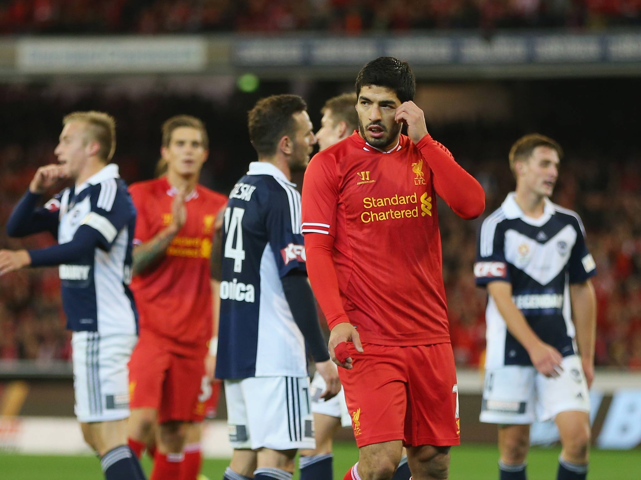 Luis Suarez in action against Melbourne