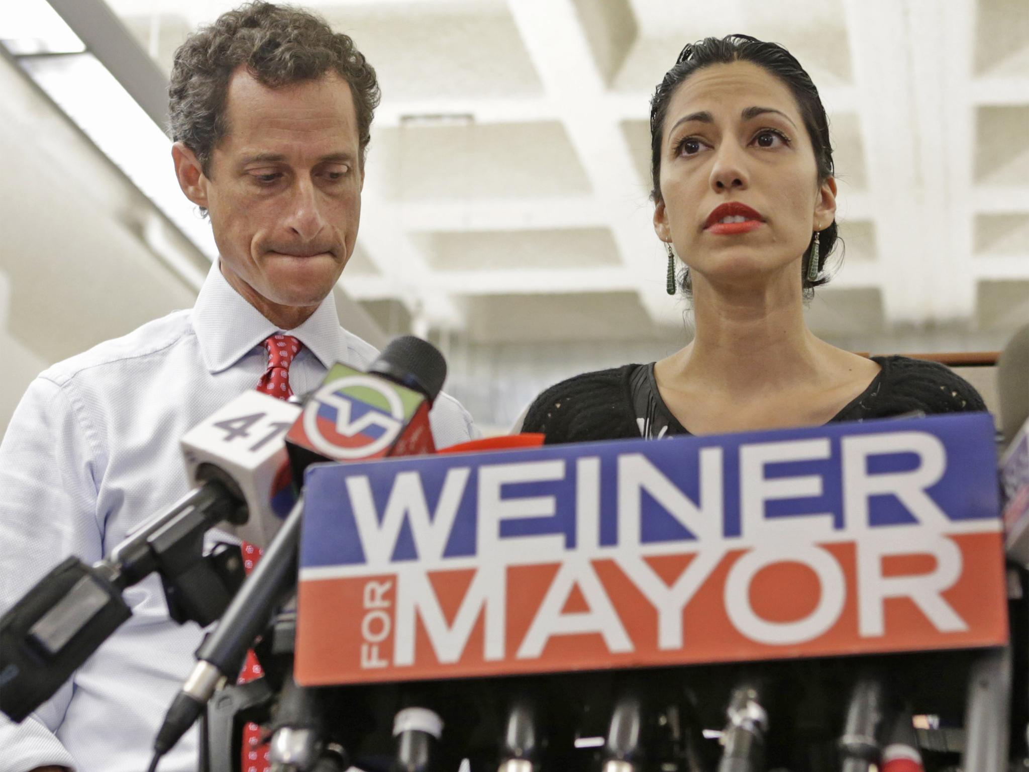 Weiner and Abedin at a press conference after news of his second sexting scandal broke in 2013