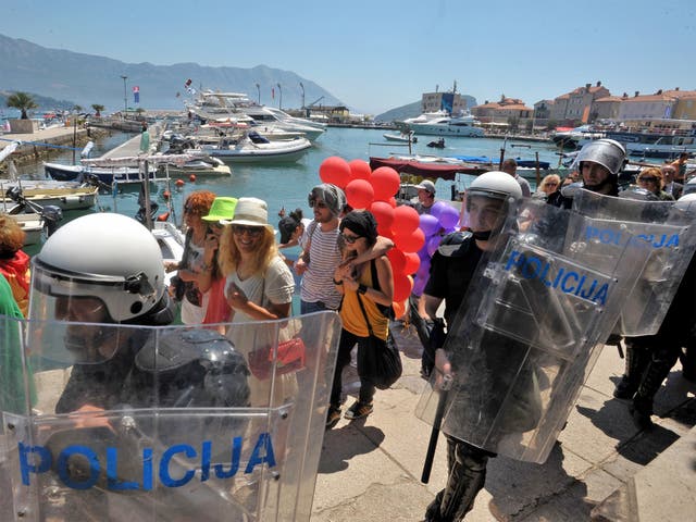 Gay activists march during Montenegro’s first pride event in the seaside resort of Budva