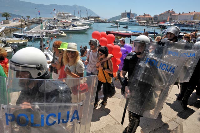 Gay activists march during Montenegro’s first pride event in the seaside resort of Budva