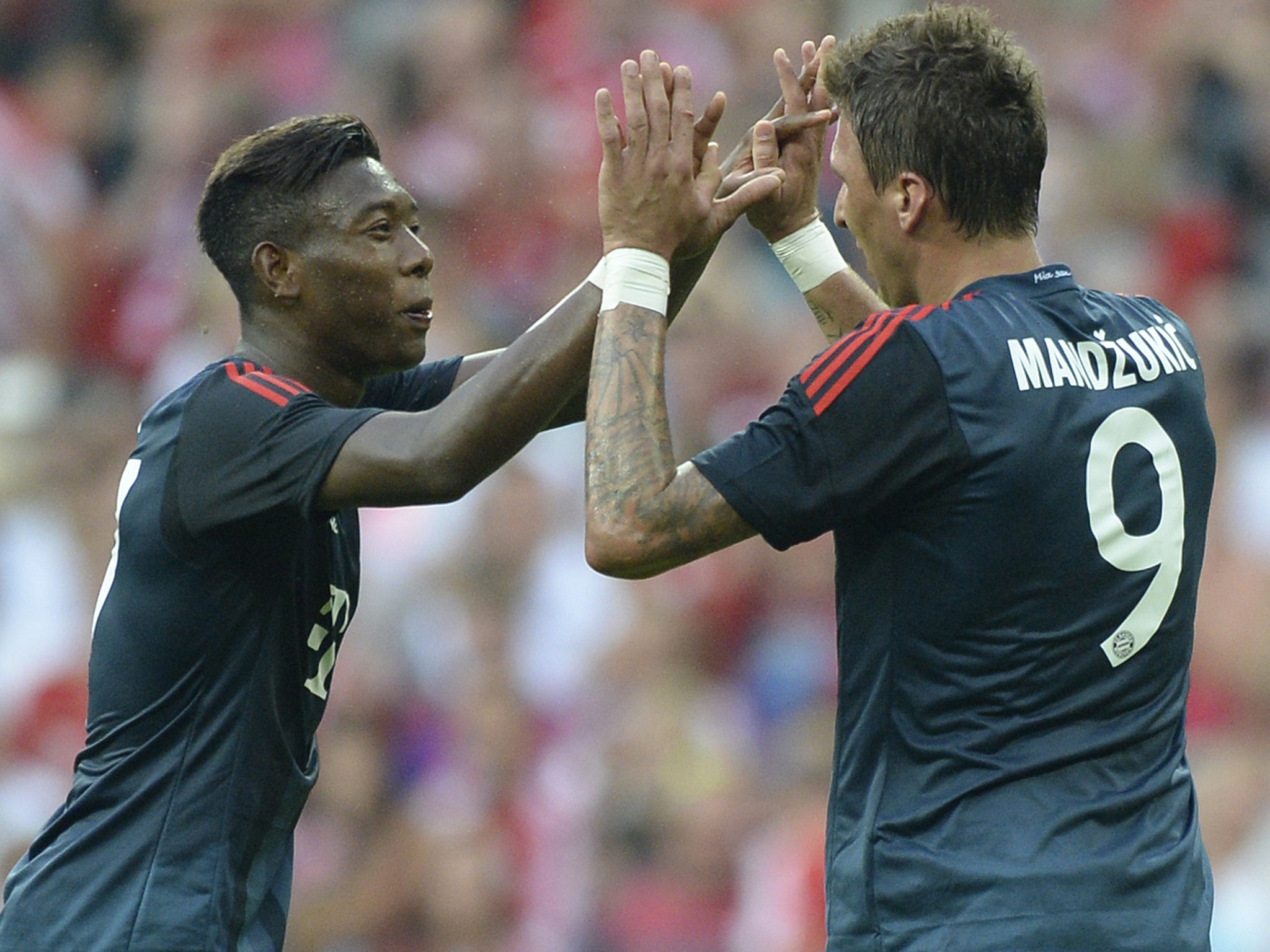 Bayern Munich's David Alaba and Mario Mandzukic celebrate their second goal