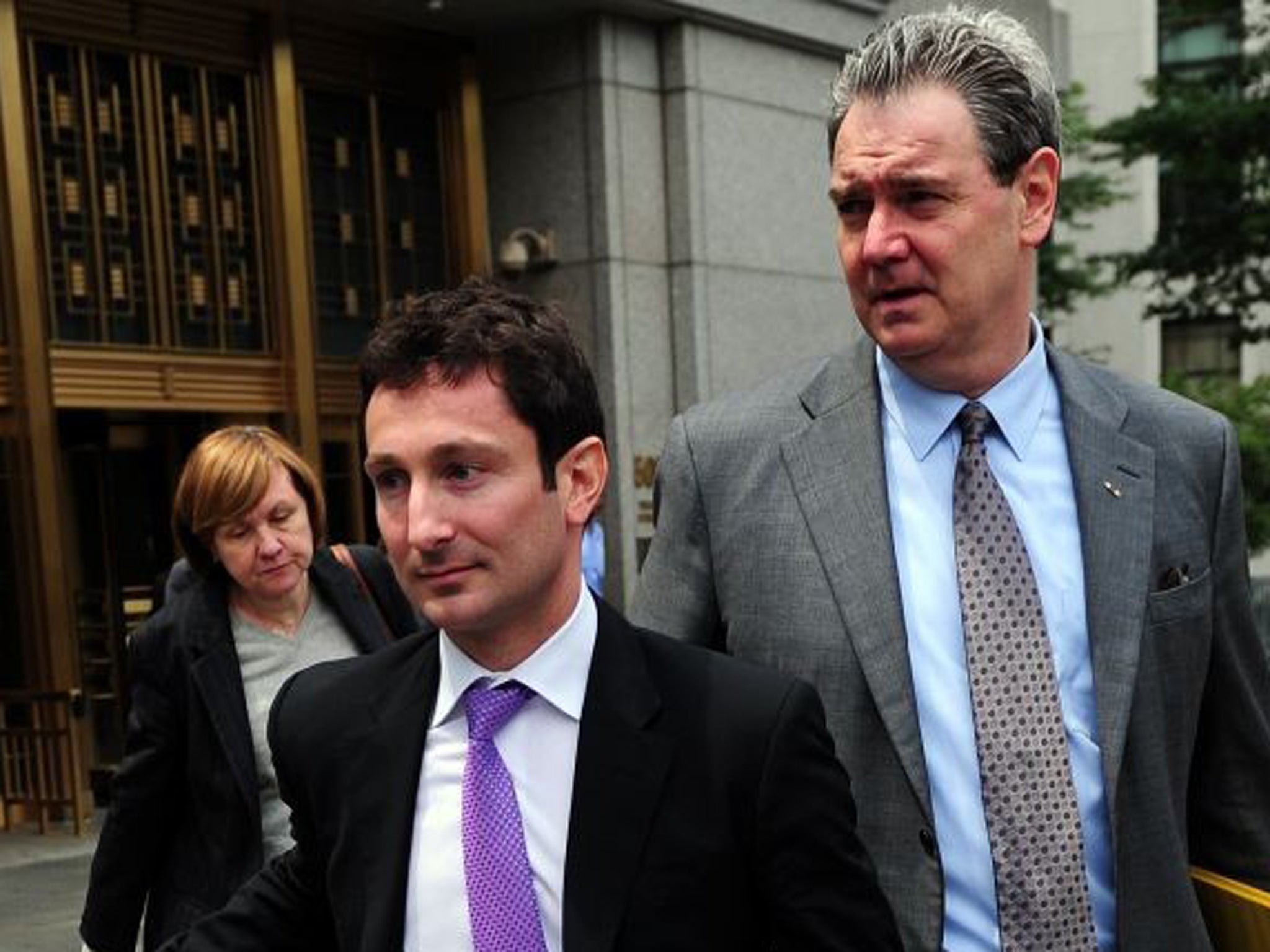 Fabrice Tourre, left, with his lawyer Sean Coffey outside the federal court in New York