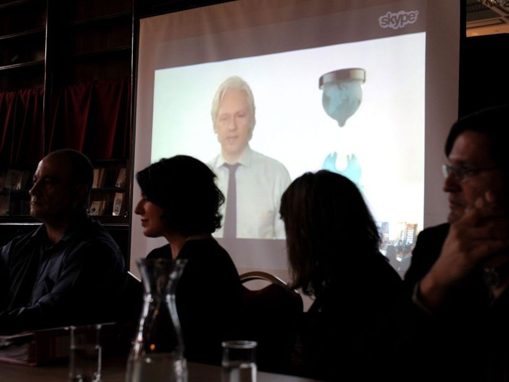 Wikileaks Party candidate Julian Assange speaks from London during the official launch and announcement of Senate candidates in Melbourne, Australia