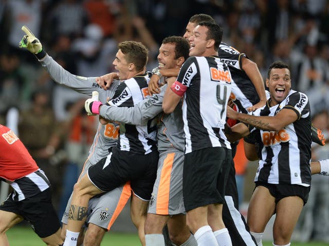 Atletico Mineiro's players celebrate after winning the Libertadores Cup 